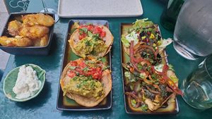 Potatoes, avocado tacos, mushroom tacos. The mushroom one was our favorite. at B.Better in Paris