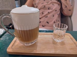 Latte with coconut milk with vanilla syrup shot at B.Better in Paris