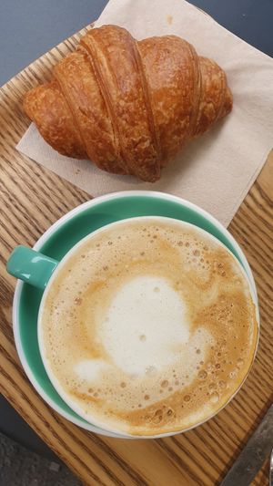 Coffee and croissant at Land & Monkeys - Turenne in Paris