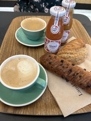 Breakfast menu with Cappuccino, juices, viennoiserie au chocolat and Chausson à la pomme  at Land & Monkeys - Turenne in Paris