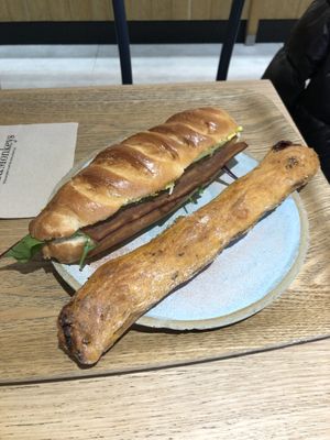 Bacon sandwich and sundried tomato breadstick  at Land & Monkeys - Turenne in Paris
