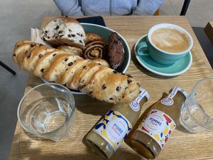 Breakfast for three - coffee, juices, and a greedily chosen bowl of pastries!   at Land & Monkeys - Turenne in Paris