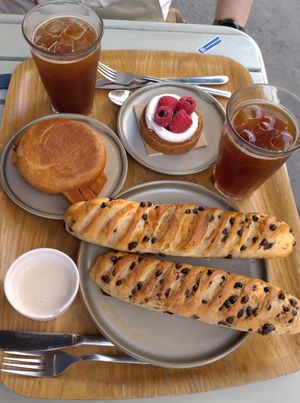 Viennoise au chocolat, breakfast muffin, raspberry tart, iced Americanos at Land & Monkeys - Turenne in Paris