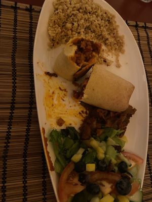 Vegan Veggie Wrap (warm and super tasty) with mushrooms, couscous, and salad sides.  at Rock 'n' Troll Coffee House in Borgarnes
