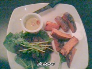 Yam wedges & black bean burger with salad at Koi in Calgary