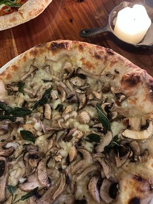 Vegan Funghi pizza - mushrooms, vegan mozzarella, confit garlic, truffle oil  at Jarrah in Hillarys