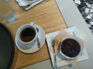 Chocolate and Raspberry vegan muffin & american coffee at Shake Café in Florence