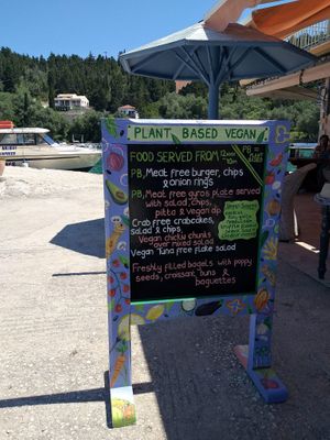 Vegan menu outside at Souvlaki - Harbour lights in Paxos