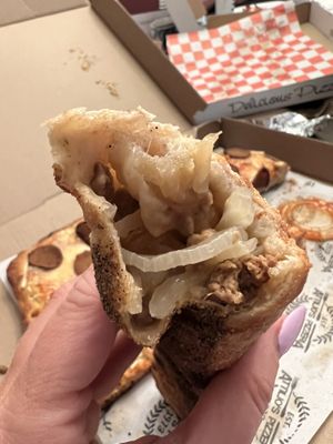 Snausage roll with onions   at Attilio's Pizzeria in Toms River