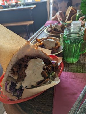 Vegan kebab w tzatziki sauce (and greek potatoes in the background!) at Döner Bei Tante Anne in Norwich