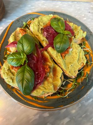Avocado, red pesto and pickled red onion sourdough toast (double portion)  at FINT Kafé & Bar in Tromsoe