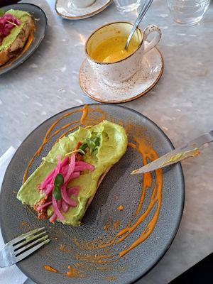Avocado toast and golden latte at FINT Kafé & Bar in Tromsoe