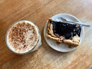 Pumpkin spice latte and vegan blondie  at FINT Kafé & Bar in Tromsoe