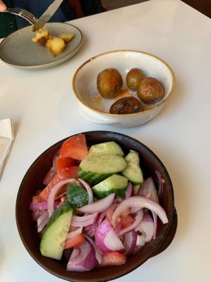 Cucumber tomato salad and Yukons  at Casa Del Cabo in Eastham