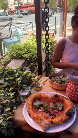 Outside view terrace  at Broadway Caffe in Paris