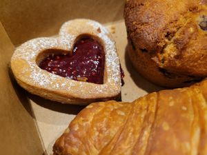 Raspberry Linzer, blueberry muffin and a croissant at Camilla's Sourdough - Love Shack Cafe in Los Angeles