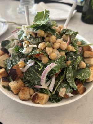 Caesar salad with chick peas, sun dried tomato and red onion.  at Garden Grille Cafe in Pawtucket