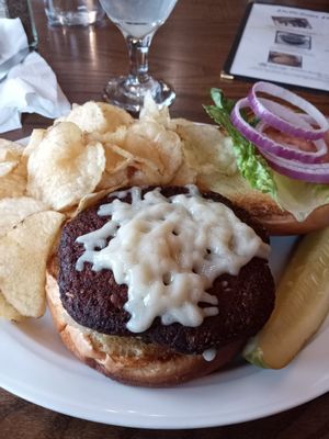 Veggie burger with house chips and vegan cheese at Alcona Brew Haus in Harrisville