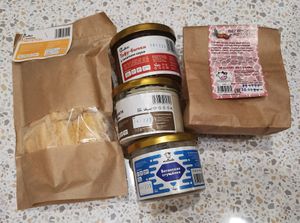 Part of the joint purchases of tofu products from Mallakto, Dec, 2023: "nuggets",  "gobies" in tomato sauce, tofu pate, condensed plant milk, powder mix for vegan cutlets at Veganki v Tule in Tula