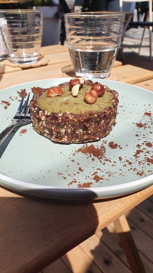 Matcha/spirulina hazelnut cake at Zelena Sredina in Sarajevo
