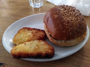 Sausage sandwich and hash browns (May 2025) at Clock Tower Cafe in Morpeth