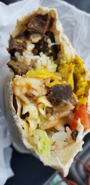 Gigantic wrap + smoky seitan  at Loving Hut in Arlington