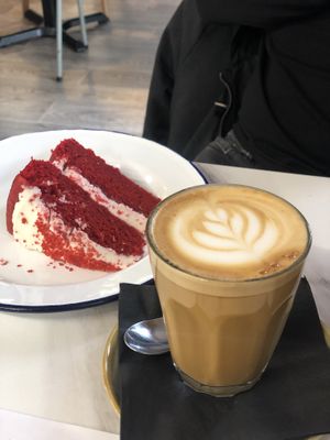 Oat latte and red velvet cake at Wild Root in Southport