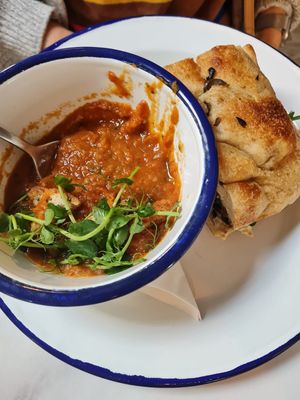 Tomato and basil soup 🤤 & roasted aubergine & hummus focaccia   at Wild Root in Southport