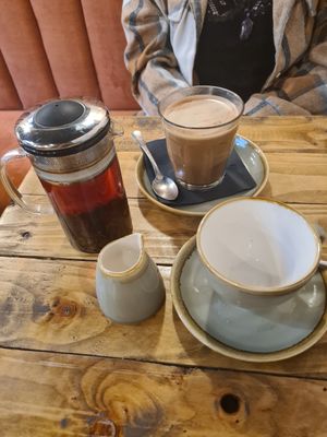 Loose leaf tea and a mocha both with oat milk at Wild Root in Southport