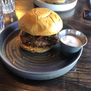 Gaucho burger(terrible pic) (comes with soured cream, jalapeños, Roquito peppers, chilli jam).   at Tango in Durham