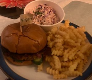 Courgey Pike burger, fries and slaw (takeaway)  at The Round in Keswick