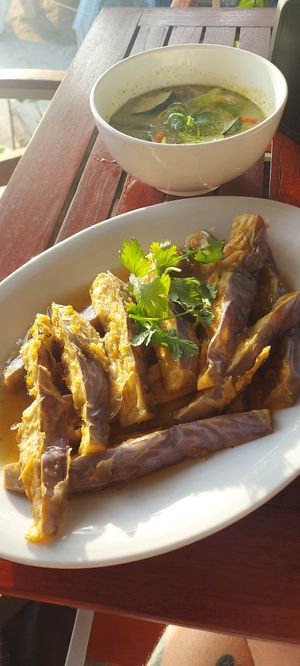 the Pad Makhua (battered fried eggplant) and green curry at Thai Blue Elephant in Roatan