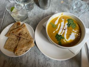 Spiced lentils crispy chickpeas, coconut yoghurt, house flat bread  at Grind in South East London