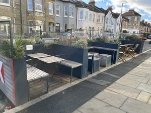 Outdoor seating with no table service   at Bonjour Brioche Cafe in South West London
