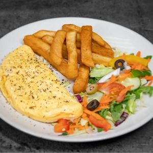 Omelette, chips and salad at Nosh in Leeds
