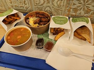 Laksa soup + veganer salad + baked potatoes + onion rings + souces at Veganer  in Sarajevo