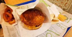 Burger, onion ring, wrap and sauce at Veganer  in Sarajevo