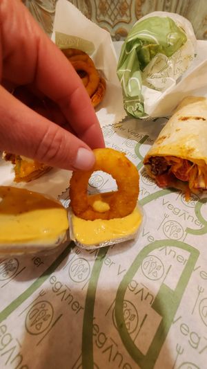 Onion ring with amarillo sauce at Veganer  in Sarajevo