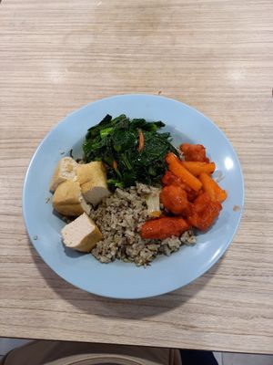 Olive fried rice, kai lan, tofu puff, sweet and sour pork at Jin Hong Vegetarian 金红素食 - Bugis in Central Singapore