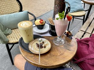 Dirty chai, moonseed muffin, and a strawberry smoothie. All 100% vegan.  at Coffee Break in Groningen