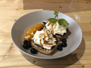 Wolke 7 breakfast: danish bun, vegan nut creme and soy whipped cream   at P-Cafe in Gottingen