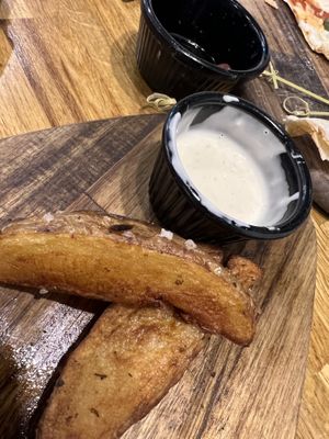 Huge Wedges with Vegan Garlic Aioli. (There we’re lots more than this!)  at Secret Garden in Newquay