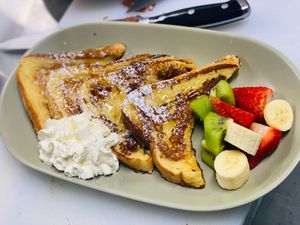 Vegan French Toast with seasonal fruit and vegan cream  at The Sage Village in Campbelltown