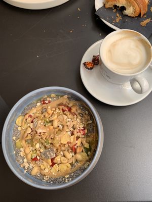 Chia pudding with fruit and peanut butter and a cappuccino.  at B-liv Cagliari in Cagliari