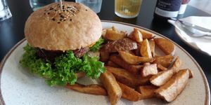 Quarter Pounder burger with chips at Holy Cow Lounge in Edinburgh