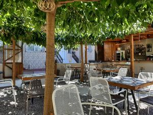 Lovely outdoor seating area  at Libre Garden in Pefkochori