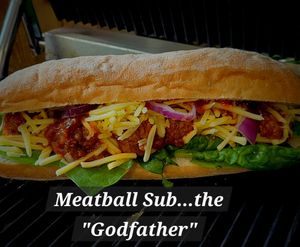 Vegan meatballs in  tomato and basil marinara, with baby spinach shredded cheese & red onion at Curran Geal in Edinburgh