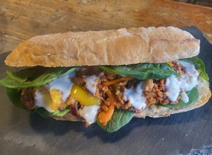 The "Philly Cheesesteak". This Isn't Minced Beef, sautéed with fresh chilli, bell peppers and red onion. With spinach, mushroom ketchup and blue cheese dressing at Curran Geal in Edinburgh