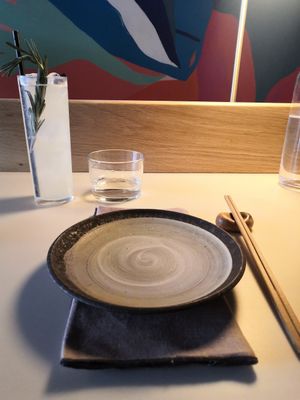 Place setting at the bar and Shrinrinyoku cocktail at KUSAKI in Brighton