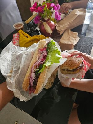 My The Biome baguette and my partner's Three Amigos bun. at It's Alive Bakery & Fermentory in Rodney Bay
